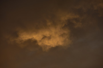 clouds of different shapes, sizes and colors