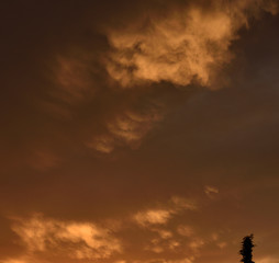 clouds of different shapes, sizes and colors