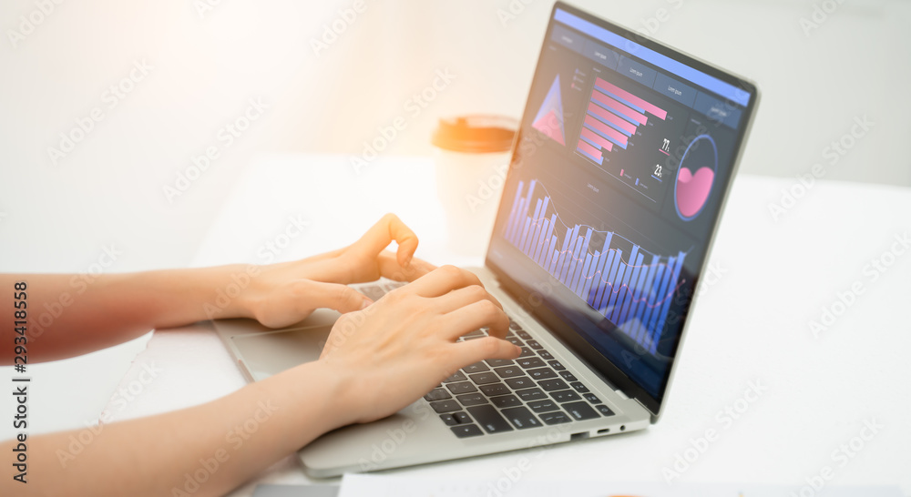 Wall mural close-up of business woman typing on the keyboard.business working concept business woman hand use l