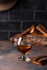 Glass of cognac or whiskey.