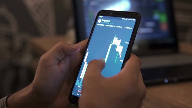Block-chain, trading online, Cryptocurrency trend graph. Man touching screen, browse foreign exchange market data, chart. Forex. Crypto currency. Bitcoin cryptocurrency. Candle graph. investment