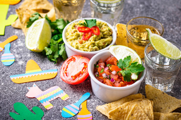 Guacamole, salsa, nachos and tequila