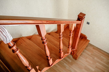 Contemporary brown wooden stairs in the house