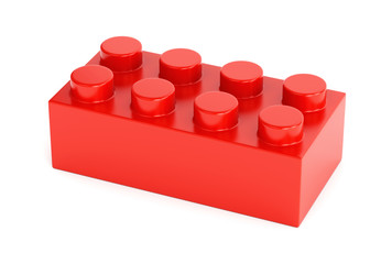 Red plastic toy building block on white background