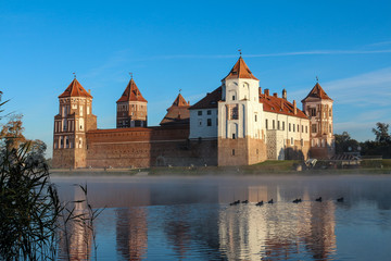 Fototapeta premium Mir castle and duck pond. Belarus landmark
