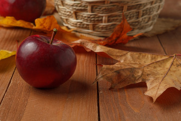 Red apple on a wooden table