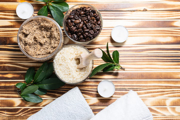 Fototapeta na wymiar Body and face care concept. Ingredients for natural coffee and salt scrub on dark wooden background. Template beauty blog social media. Spa and wellness concept.