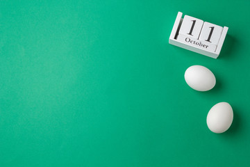 World Chicken Egg Day, October 11th, calendar and white eggs