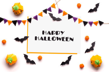 Happy Halloween text on white sheet of paper