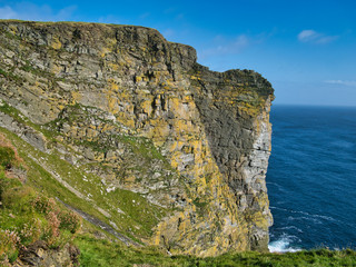 Naklejka premium cliffs on the south Shetland coast near Sumburgh Head - the bedrock in this is the Bressay Flagstone Formation - sandstone and argillaceous rocks which are interbedded.