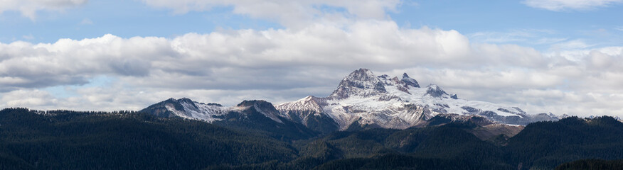 Beautiful Panoramic View of Canadian Mountain Landscape during a colorful and vibrant evening in Fall Season. Taken on a trail to Watersprite Lake near Squamish, North of Vancouver, BC, Canada.