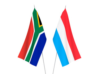 National fabric flags of Luxembourg and Republic of South Africa isolated on white background. 3d rendering illustration.