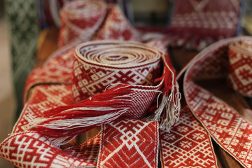 National symbols of Latvia. Closeup of Lielvarde belt stock photo. Latvian folk costumes belt. The...