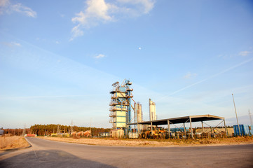 Fototapeta premium Modern industrial building over blue sky