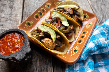 Mexican vegan tacos with avocado and mushrooms