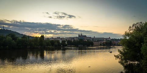 Scenic panorama cityscape view of Moldava river boat Prague in Czech Republic.
