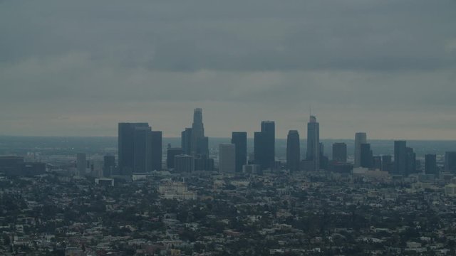 FIXED EST Establishing shot of Los Angeles Downtown from Griffith observatory, all brand names and logos removed. 4K UHD