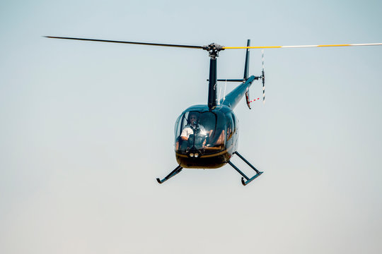 Helicopter Pilot During Flying In Robinson R44