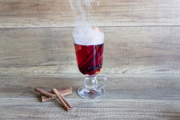 Mulled wine, wine hot drink with spices and grapefruit