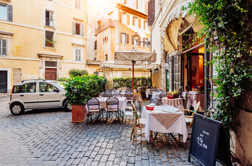 Fototapeta na wymiar View of old cozy street in Rome, Italy