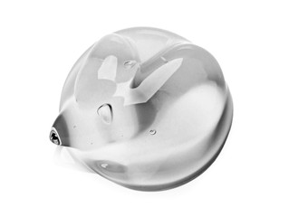 Fototapeta premium Squeezed cosmetic clear cream gel texture Iisolated on white background. Close up photo of transparent drop of skin care product. High Quality transparent gel with bubbles closeup on white background