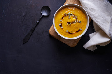 plate with pumpkin soup