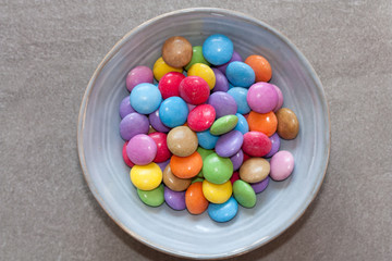 Colorful candies in a bowl.