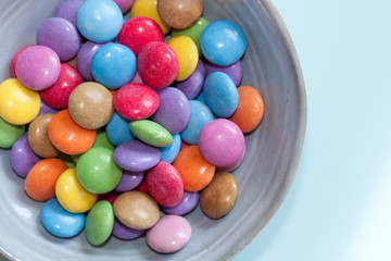 Colorful candies in a bowl.