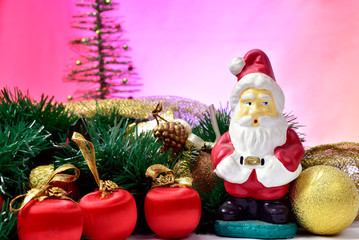 balls and colorful Christmas ornaments on the floor on colorful background