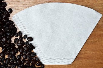 roasted coffee bean and paper colander