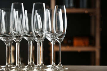 Empty clean glasses on counter in bar