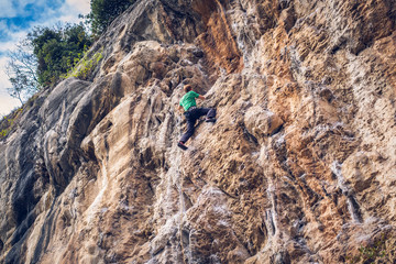Climber in Massone, Arco, Italy. Limestone.