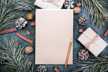Christmas background with blank notebook surrounded by Christmas decorations. Letter to Santa or Christmas shopping list - 293441166