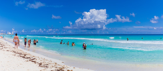 View of Cancun beach in Caribbean Sea. Exotic Paradise. Travel, Tourism and Vacations Concept
