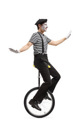 Pantomime man on a monocycle © Ljupco Smokovski