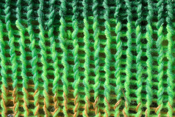 Knitted pattern fabric of green wool