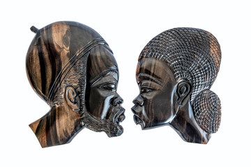 Head sculptures of an African couple facing and kissing each other sculpted on exotic solid wood