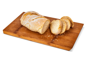 Chopped slices of bread on a bamboo cutting board.