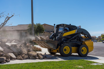Removing Debris with Heavy Duty Machinery