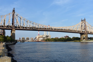 The Ed Koch Queensboro Bridge, also known as the 59th Street Bridge, and the midtown Manhattan skyline viewed from New York City's Roosevelt Island. -13