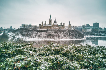 Ottawa Parliament in Winter . Cityscape of Canada's capital city, canadian travel destination in snow landscape. - obrazy, fototapety, plakaty