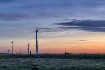 Fototapeta na wymiar Eco windmill farm - ecological electricity
