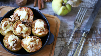 Baked quince. Autumn dish. Vegetarian recipes. Healthy dessert.