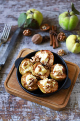 Baked quince. Autumn dish. Vegetarian recipes. Healthy dessert.