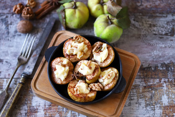 Baked quince. Autumn dish. Vegetarian recipes. Healthy dessert.