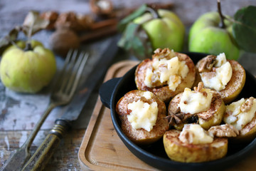 Baked quince. Autumn dish. Vegetarian recipes. Healthy dessert.