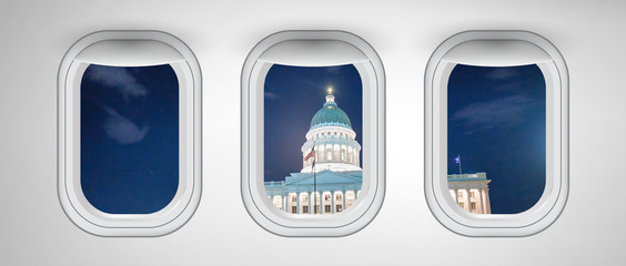 Airplane interior with window view of Salt Lake City Capitol, USA. Concept of travel and air transportation