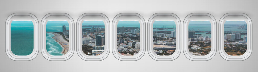 Fototapeta na wymiar Airplane interior with window view of Miami, USA. Concept of travel and air transportation