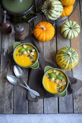 Creamy pumpkin soup topped with pumpkin 	