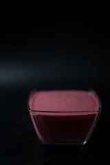 Fruit puree on a black background